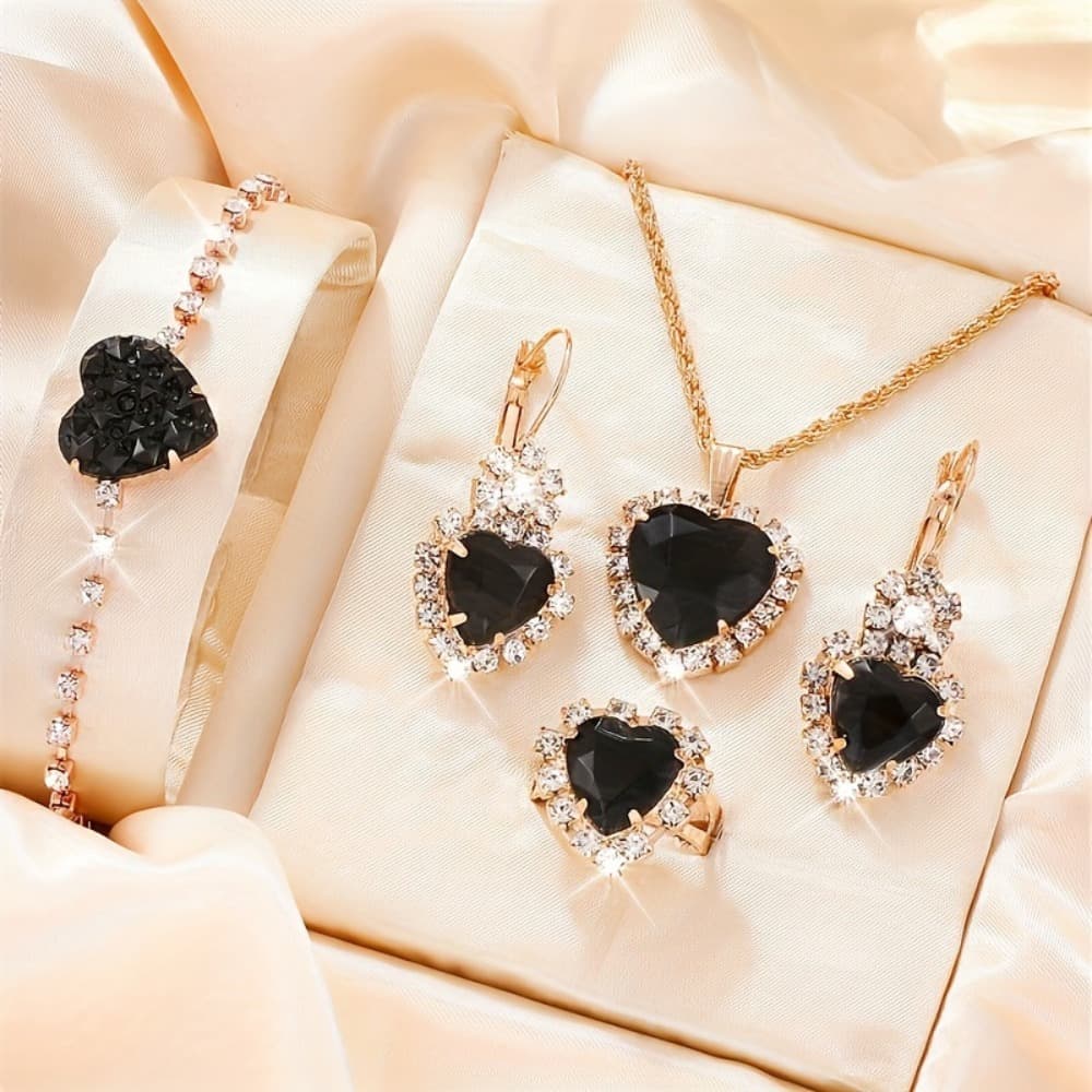 TEMU Stylish Heart-themed 4pcs Jewelry Set In Black Or Red, This Set Offers A With Its Heart Designs. Comprising Earrings, A Necklace, A Bracelet, And A Ring, Accessorizing Any Outfit.
