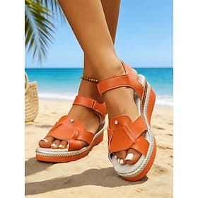 Orangefarbene Keilsandalen für Damen – bequeme und stylische Urlaubsschuhe für Strand, Reisen und Sommerausflüge.
