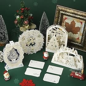 Cartes de Noël 3D pop-up, ensemble de cartes de vœux sur pied découpées au laser, motifs de sapin de Noël, couronne et village enneigé, élégantes cartes de vœu